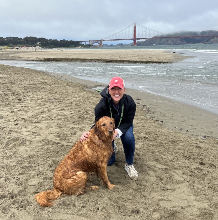 Erin Free with her golden retriever, Scarlet, near the Golden Gate